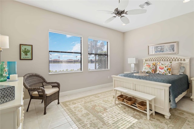 bedroom with light tile patterned flooring and ceiling fan