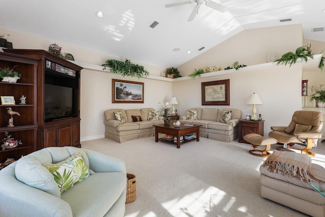 living room with vaulted ceiling, light colored carpet, and ceiling fan