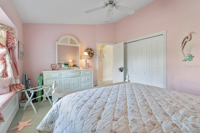 bedroom with light colored carpet, a closet, and ceiling fan