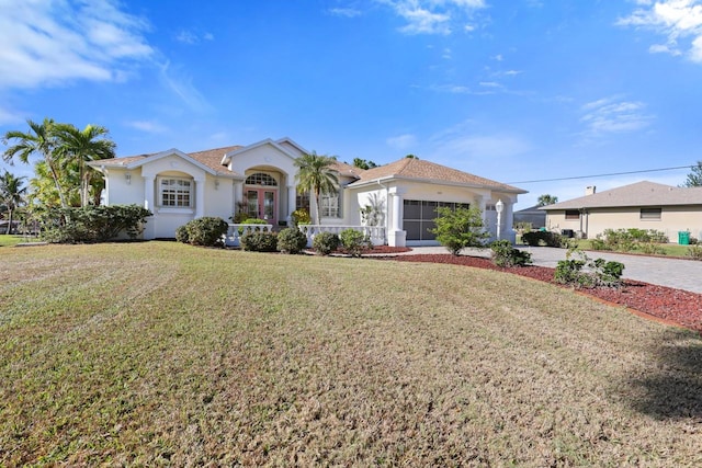 ranch-style house featuring a front lawn