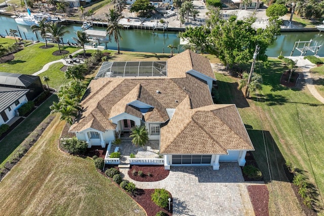 birds eye view of property featuring a water view