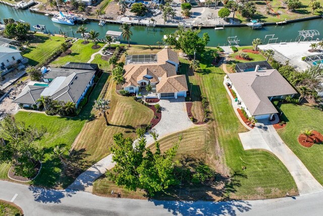 drone / aerial view with a water view