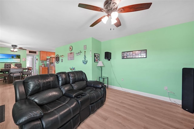 living room with light hardwood / wood-style floors