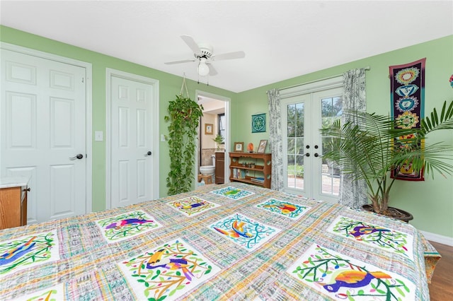 bedroom featuring french doors, ensuite bathroom, hardwood / wood-style flooring, ceiling fan, and access to exterior