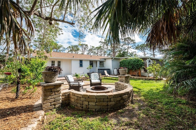 exterior space featuring a fire pit