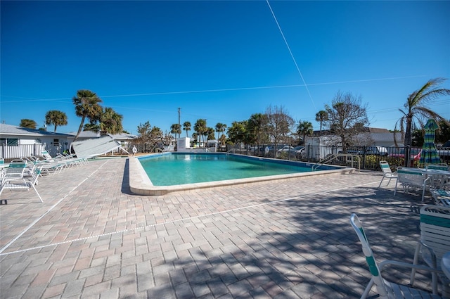 view of swimming pool featuring a patio