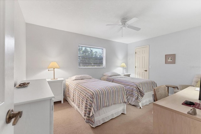 bedroom featuring ceiling fan and light colored carpet