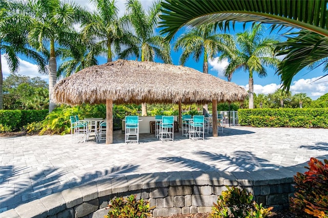 view of patio / terrace featuring exterior bar