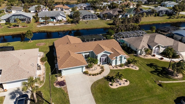 drone / aerial view with a water view