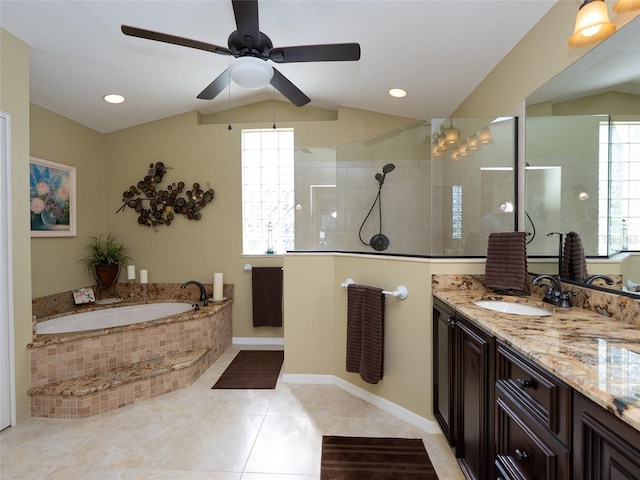 bathroom with vanity, ceiling fan, independent shower and bath, tile patterned flooring, and lofted ceiling