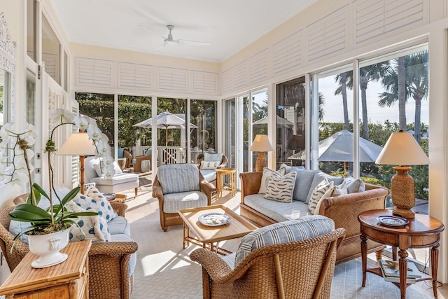 sunroom / solarium with ceiling fan