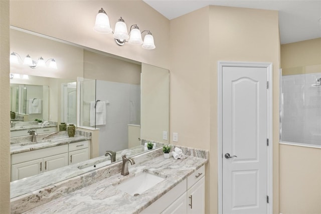 bathroom featuring vanity and a tile shower