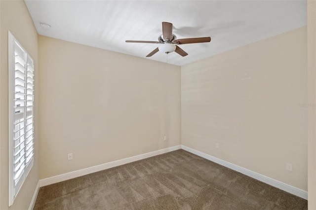 unfurnished room featuring carpet flooring, ceiling fan, and a healthy amount of sunlight