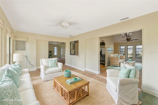 living room featuring ceiling fan