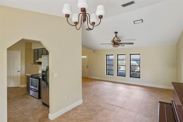 kitchen featuring appliances with stainless steel finishes, ceiling fan with notable chandelier, lofted ceiling, and light tile patterned floors