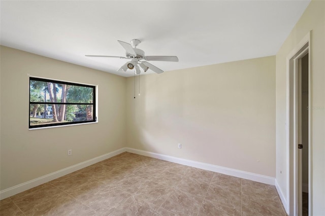 unfurnished room featuring ceiling fan