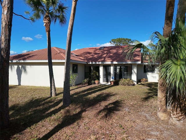 view of front of home with a front yard