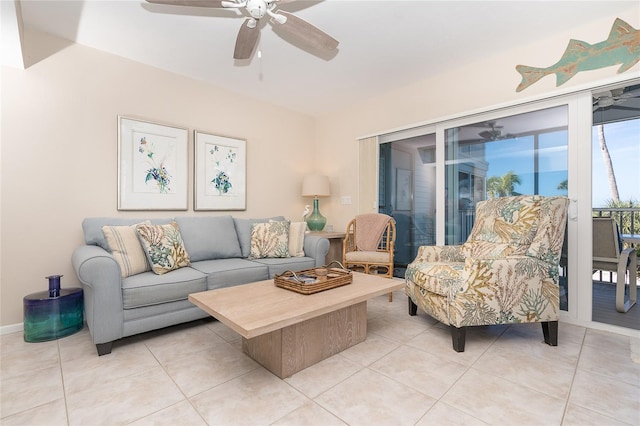 tiled living room with ceiling fan