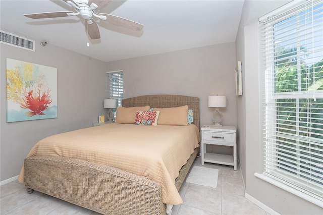 bedroom featuring ceiling fan and light tile patterned flooring