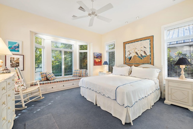 carpeted bedroom with ceiling fan