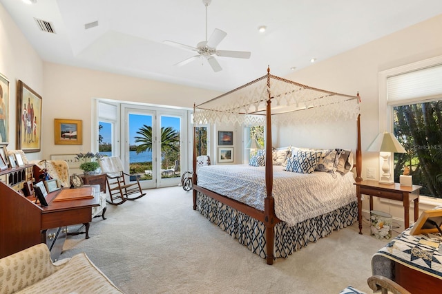 bedroom with access to outside, ceiling fan, and light carpet