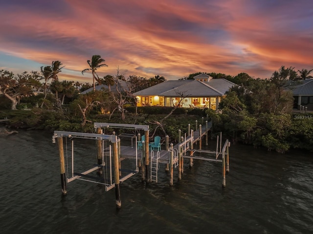 dock area featuring a water view