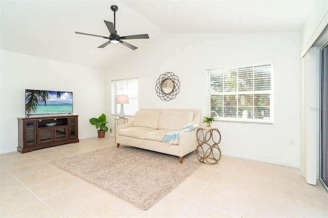 living room featuring lofted ceiling, light tile patterned floors, and ceiling fan