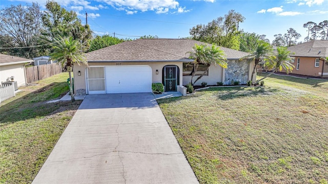 single story home with a front yard and a garage