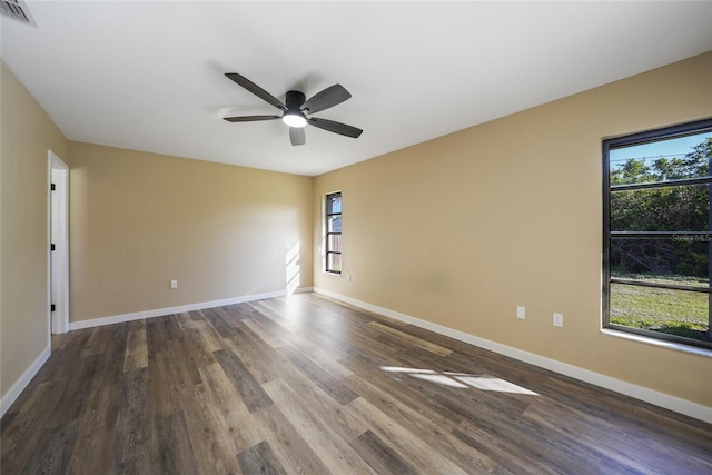 spare room featuring ceiling fan and wood-type flooring