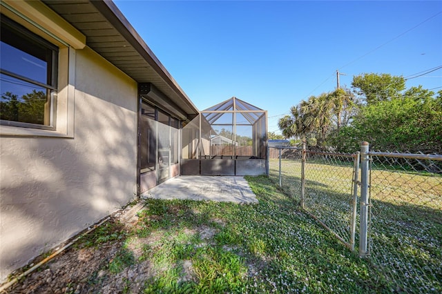 view of yard featuring a lanai