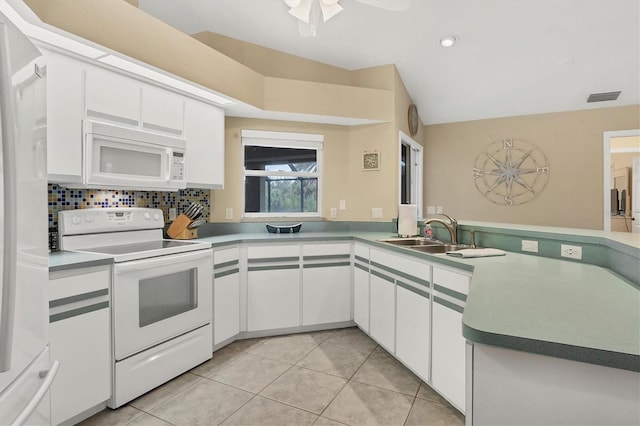 kitchen with white appliances, white cabinets, light tile patterned flooring, backsplash, and sink