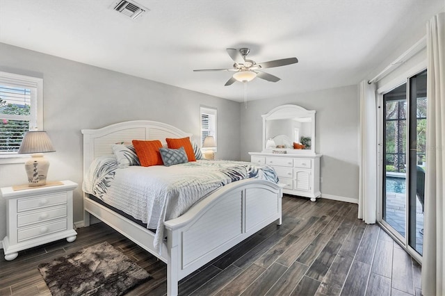 bedroom featuring ceiling fan, access to outside, and dark hardwood / wood-style floors