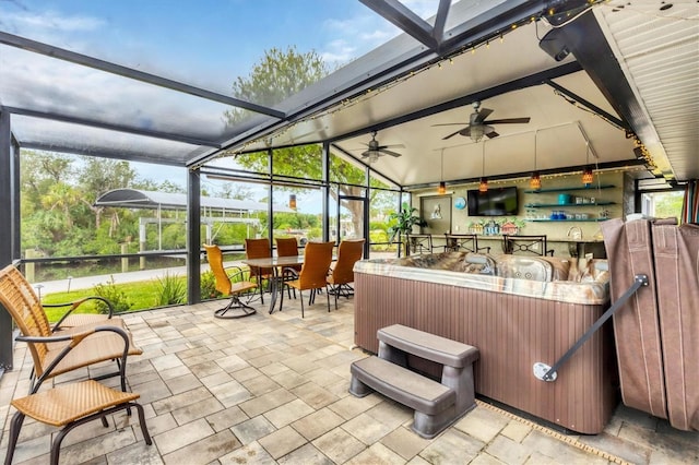 view of patio featuring a jacuzzi, a lanai, and ceiling fan