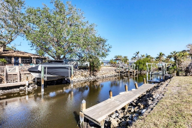 dock area featuring a water view