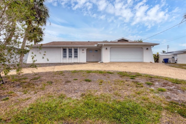 single story home with a garage