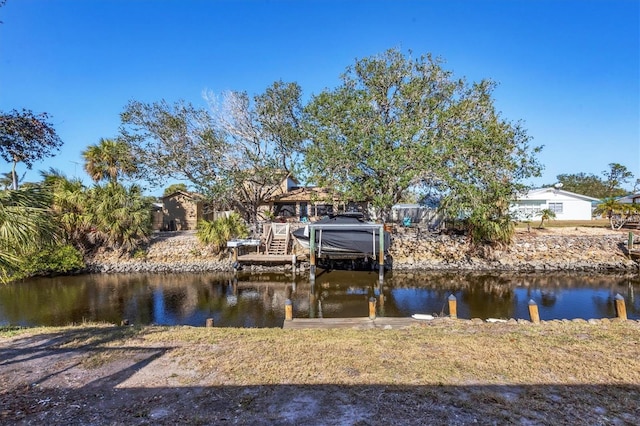 dock area featuring a water view