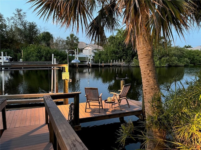 view of dock with a water view