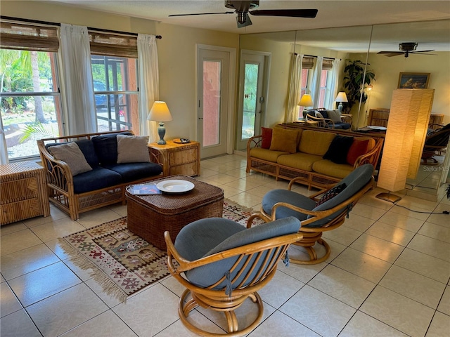 living room with light tile patterned floors, ceiling fan, and a healthy amount of sunlight