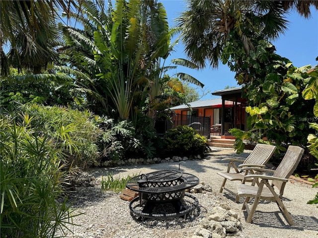 view of patio with an outdoor fire pit