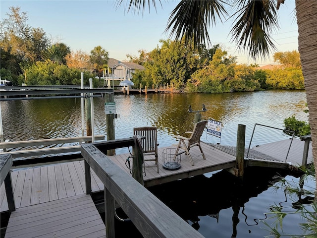 view of dock with a water view