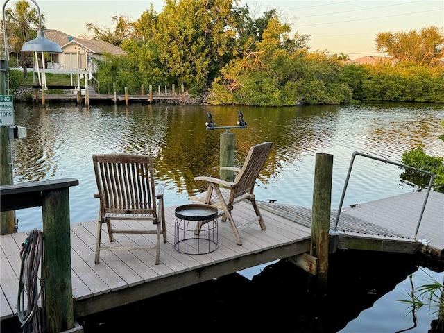 view of dock with a water view