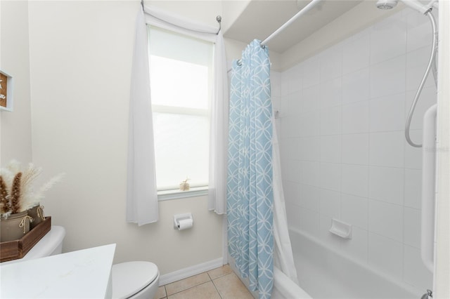 full bathroom featuring tile patterned floors, vanity, toilet, and shower / bath combo with shower curtain