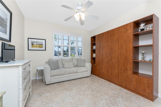 living room with ceiling fan