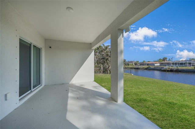 view of patio / terrace featuring a water view