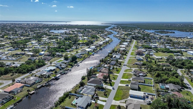 bird's eye view with a water view