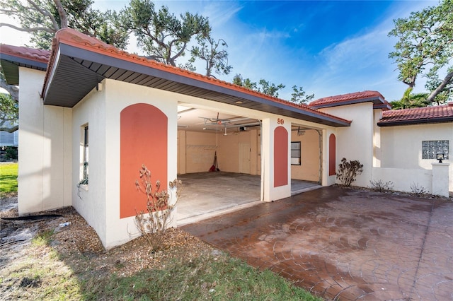 view of side of property featuring a patio