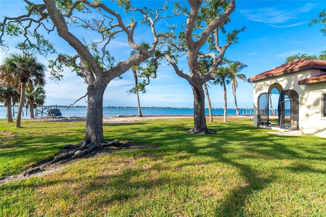 view of yard with a water view