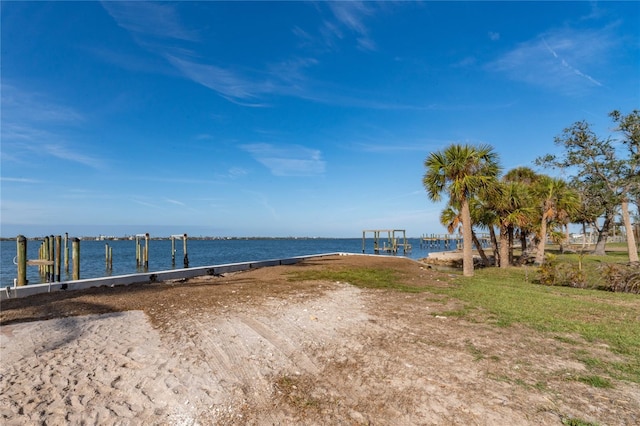 property view of water with a dock