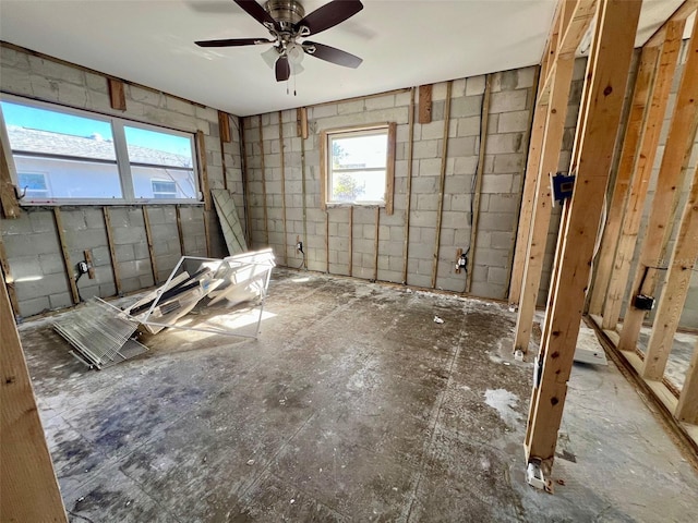 interior space featuring ceiling fan