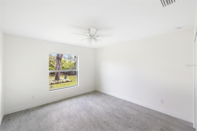 spare room featuring ceiling fan